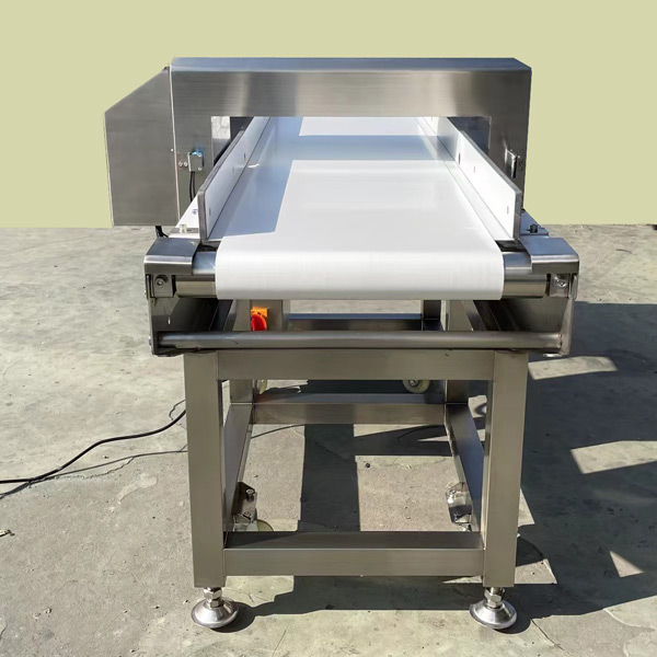 Metal detector machine for food processing