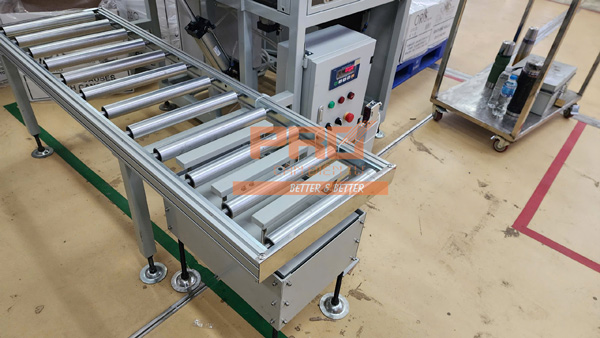 Cân tự động trên băng chuyền
