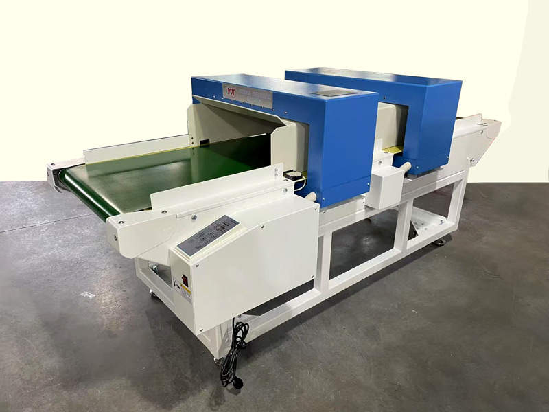 Máy dò kim loại trong may mặc